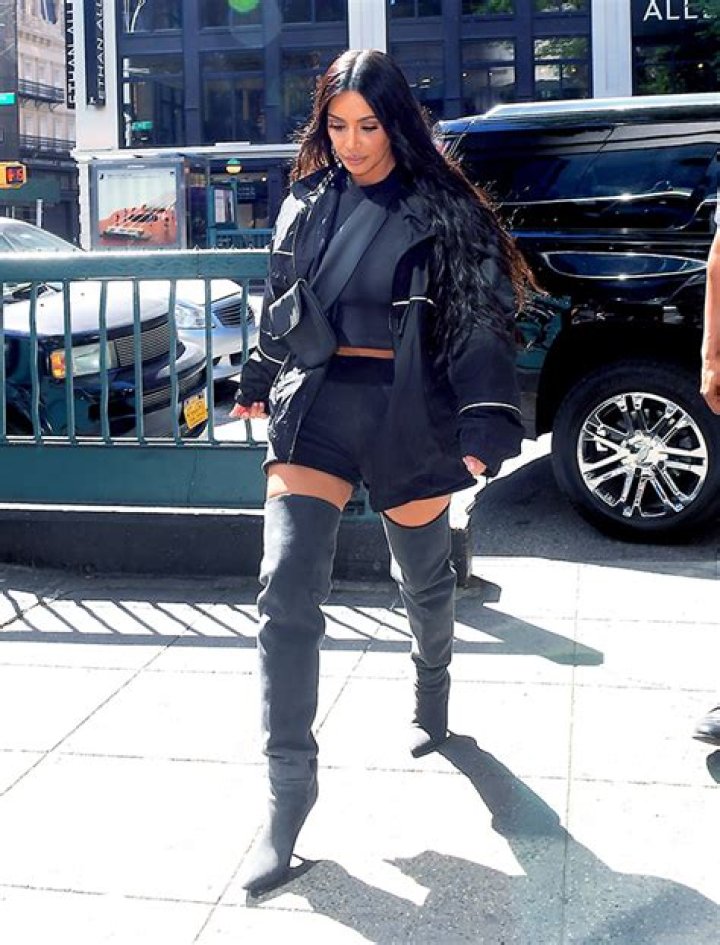 Kim Kardashian's Iconic Thigh High Boots: A Fashion Statement of Power and Confidence